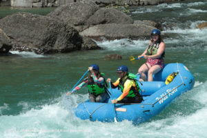 Rafting the River blue raft Wild River Adventures